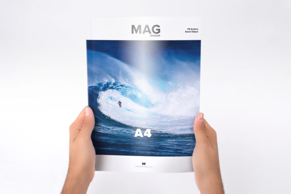 A4海报样机素材 Holding Closed A4 Magazine Mockup