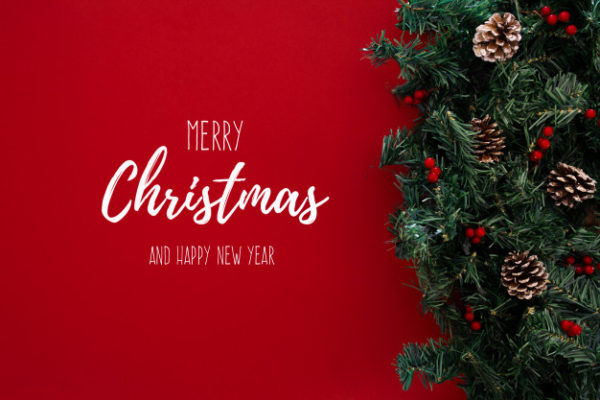 圣诞节元素背景 Merry christmas topic on a red background with christmas tree Photo
