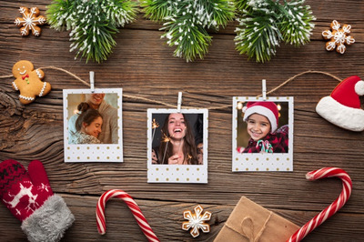 木制圣诞家庭照片背景 Top view family photos on wooden background PSD file