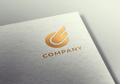 白色纹理纸上的金色logo样机[PSD]