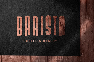 浮雕青铜logo标志模型在深色纸上的样机（PSD）