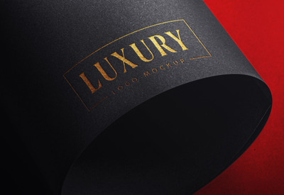 黑色卡纸上的奢华logo样机[PSD]