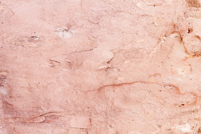 粉红色的石头砌墙背景